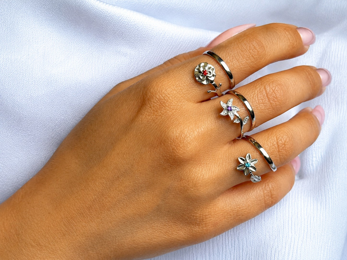 Stellera Birth Flower Rings in sterling silver